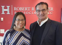 Henry Boucha is more than a hockey legend Henry Boucha and a woman standing smiling at camera