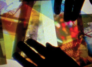 hands on multicolored computer screen